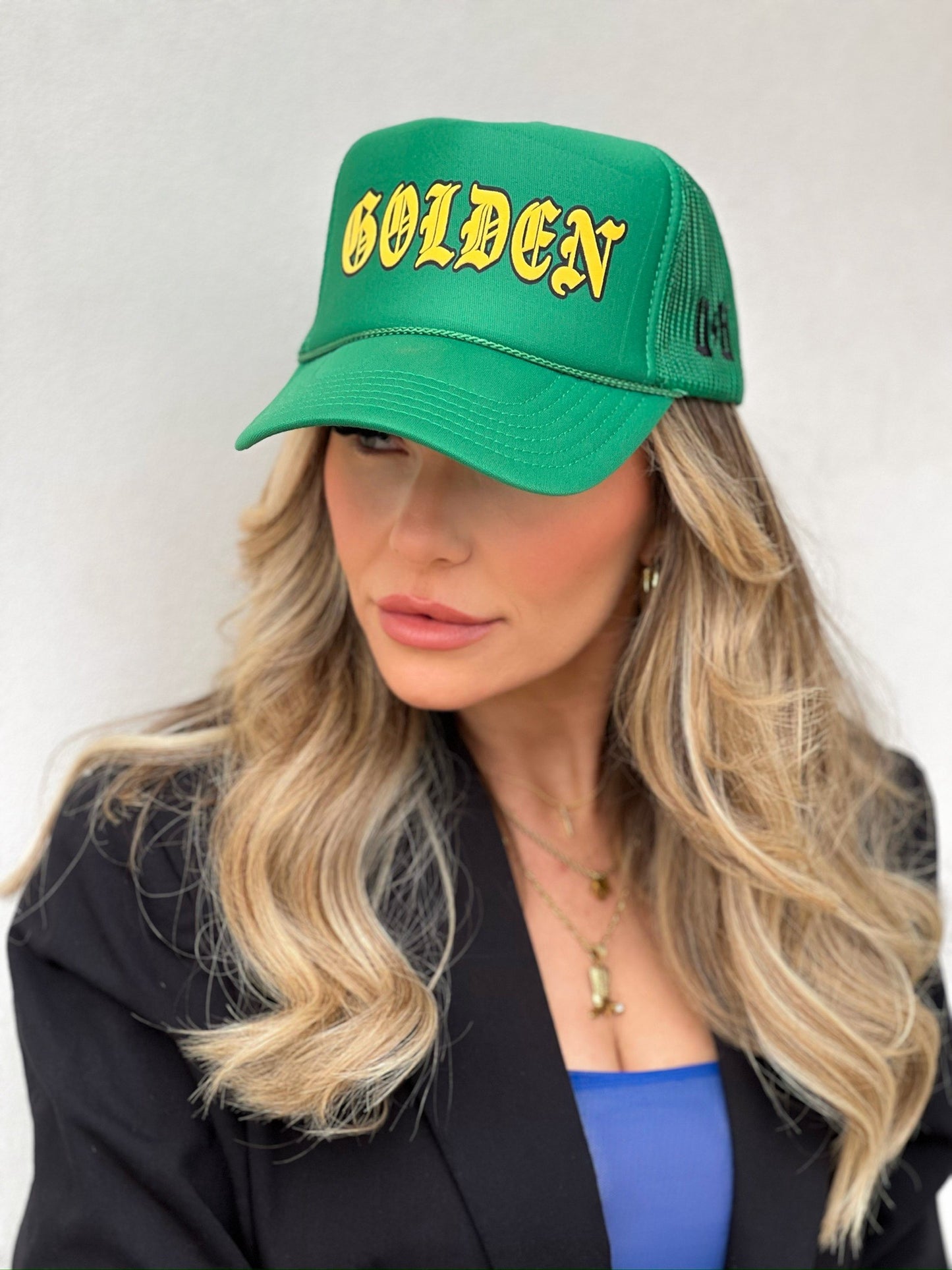 UNRULY GOLDEN TRUCKER HAT